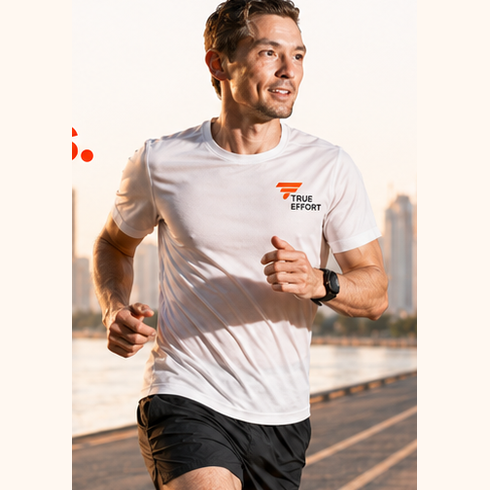 Runner training in hot sunny conditions beside a city waterfront